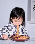 Kids Smock Bib in Black Sunflowers