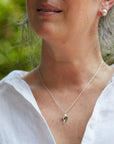 Hannah Blount Jewelry Little Whelk Shell in Bright Sterling Silver