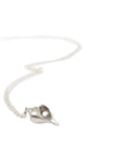 Hannah Blount Jewelry Little Whelk Shell in Bright Sterling Silver